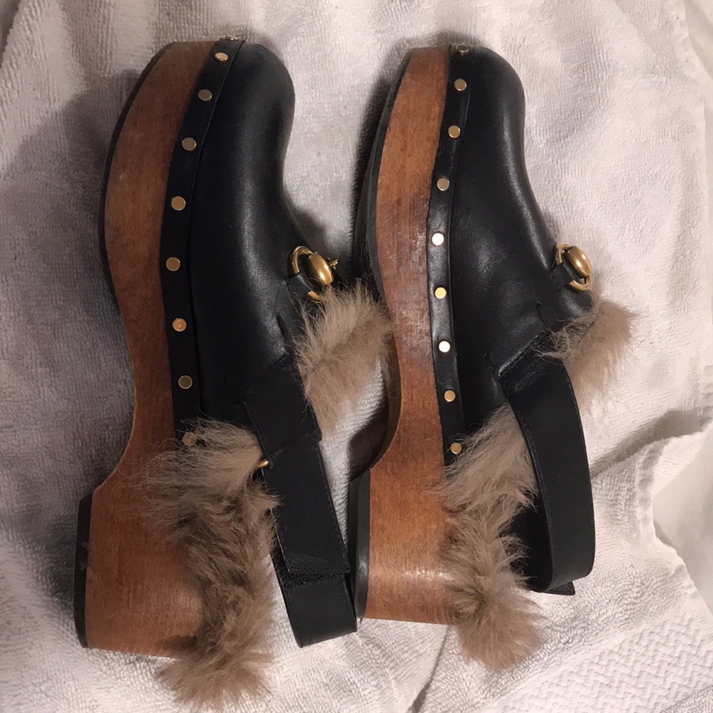 Gucci clogs.